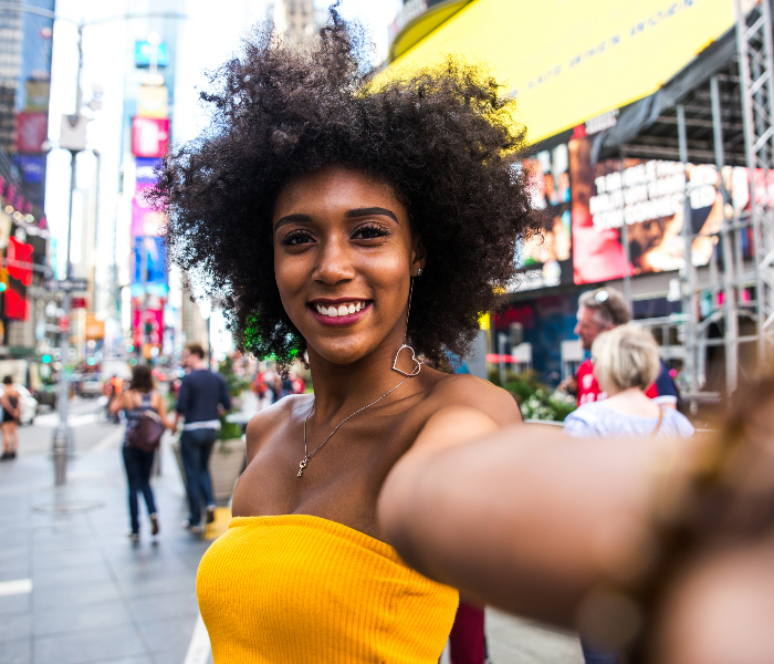 Smiling woman in Times Square