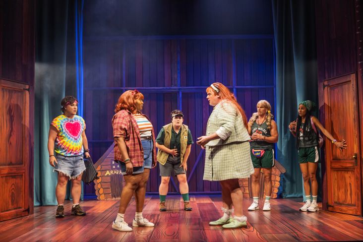 A bunch of actors playing kids at camp in a bunk